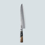 Cuchillo Aiko de acero damasco negro con mango de resina de color negro